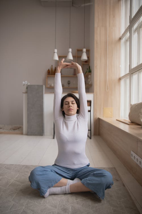 Woman stretching with good posture and back support